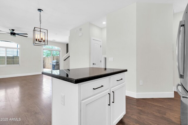 1350 S Greenfield Rd Unit 1166, Mesa, AZ 85206 - kitchen with freestanding refrigerator, ceiling fan, dark countertops, dark wood-type flooring, and recessed lighting