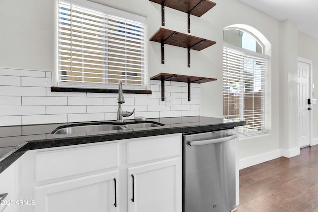1350 S Greenfield Rd Unit 1166, Mesa, AZ 85206 - kitchen with open shelves, stainless steel dishwasher, a sink, tasteful backsplash, and white cabinetry