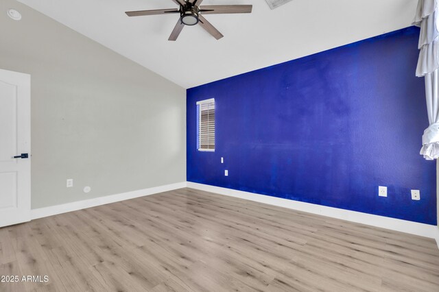 1350 S Greenfield Rd Unit 1166, Mesa, AZ 85206 - unfurnished room with vaulted ceiling, ceiling fan, wood finished floors, and baseboards