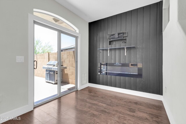 1350 S Greenfield Rd Unit 1166, Mesa, AZ 85206 - empty room with wood finished floors and baseboards