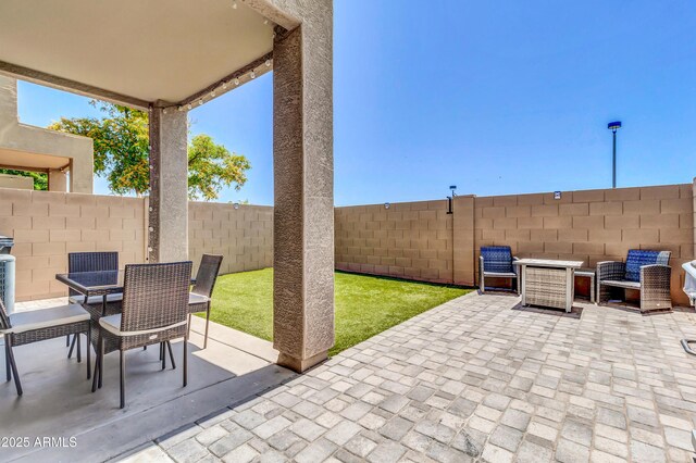 1350 S Greenfield Rd Unit 1166, Mesa, AZ 85206 - view of patio / terrace featuring fence and outdoor dining space