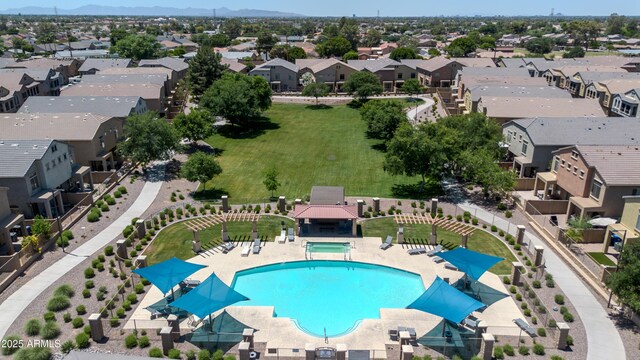 1350 S Greenfield Rd Unit 1166, Mesa, AZ 85206 - aerial perspective of suburban area with a pool area and a mountain backdrop