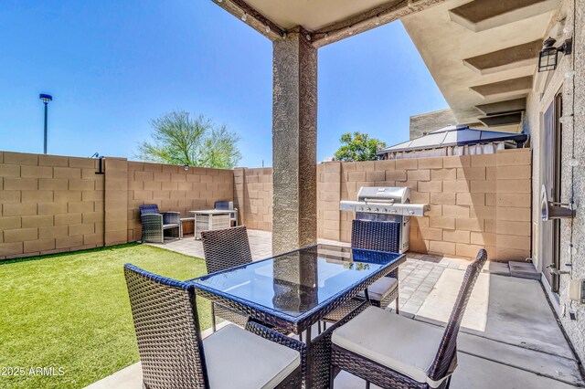 1350 S Greenfield Rd Unit 1166, Mesa, AZ 85206 - view of patio / terrace featuring a grill and outdoor dining space