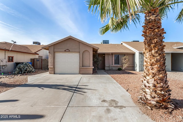 ranch-style home featuring a garage