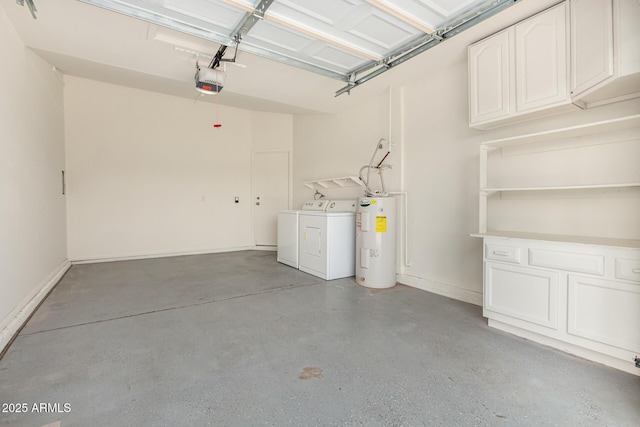 garage with electric water heater, a garage door opener, and washer and clothes dryer