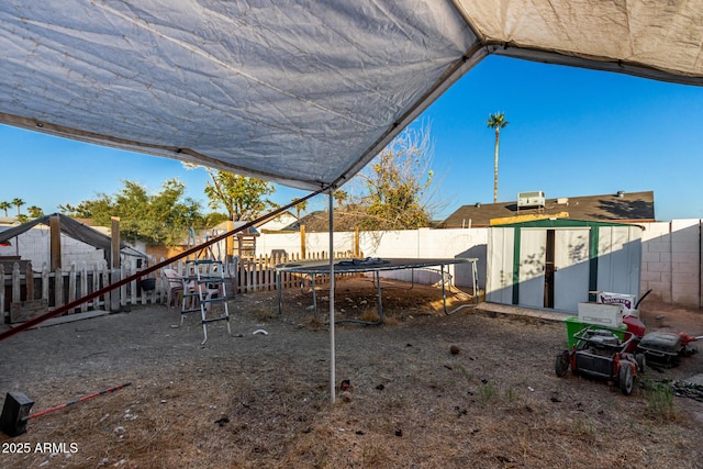 view of yard featuring a trampoline