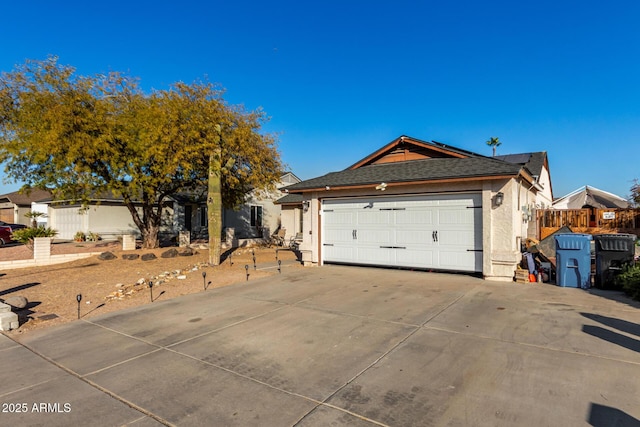 view of front of home with a garage