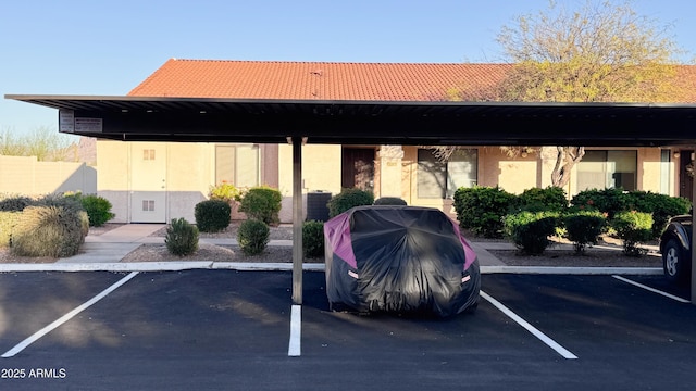 view of parking with a carport