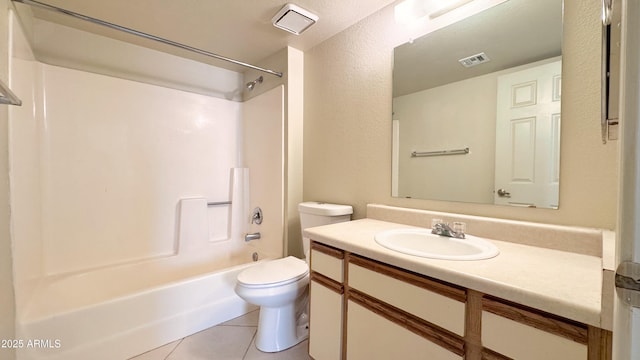 full bathroom featuring tile patterned floors, toilet, bathing tub / shower combination, and vanity