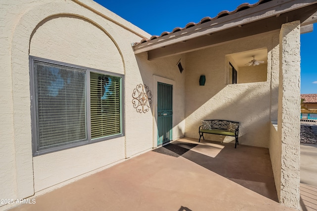 doorway to property featuring a patio