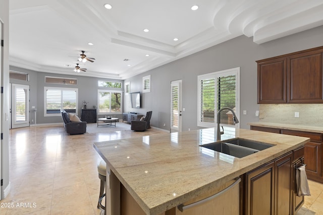 16246 E Gamble Ln, Scottsdale, AZ 85262 - kitchen with a center island with sink, light tile patterned floors, open floor plan, recessed lighting, and a ceiling fan