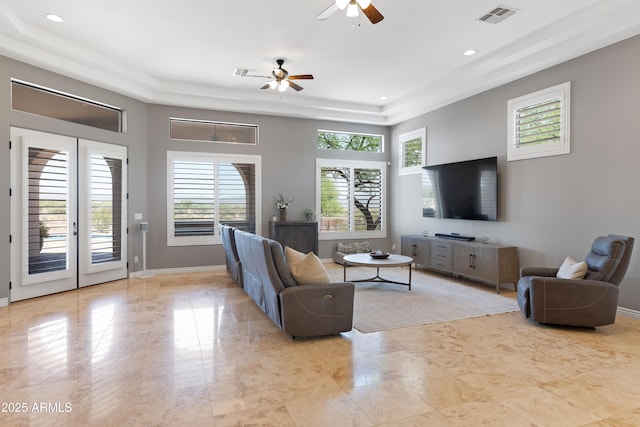 16246 E Gamble Ln, Scottsdale, AZ 85262 - living room featuring a raised ceiling, ceiling fan, and recessed lighting