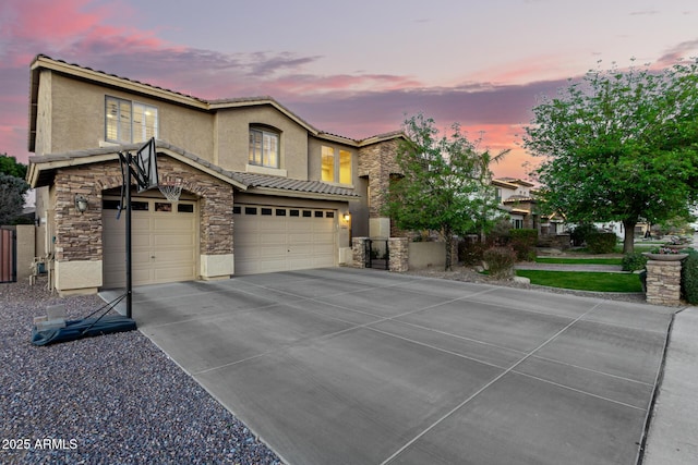 view of front of property with a garage