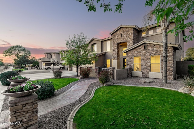 view of front of home featuring a yard