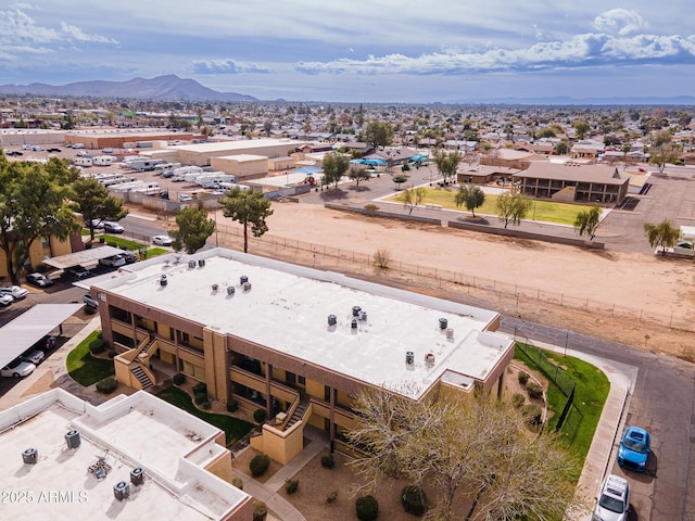 drone / aerial view with a residential view and a mountain view