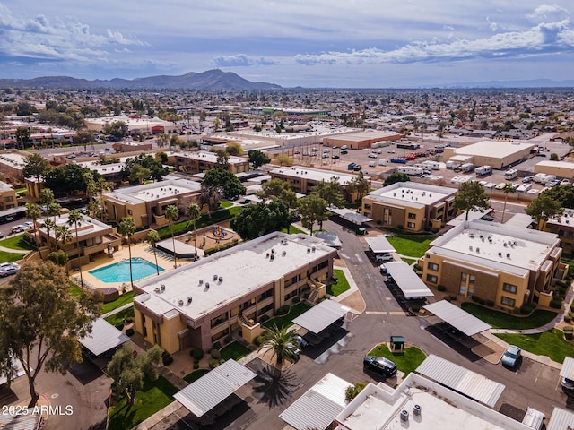 birds eye view of property featuring a mountain view