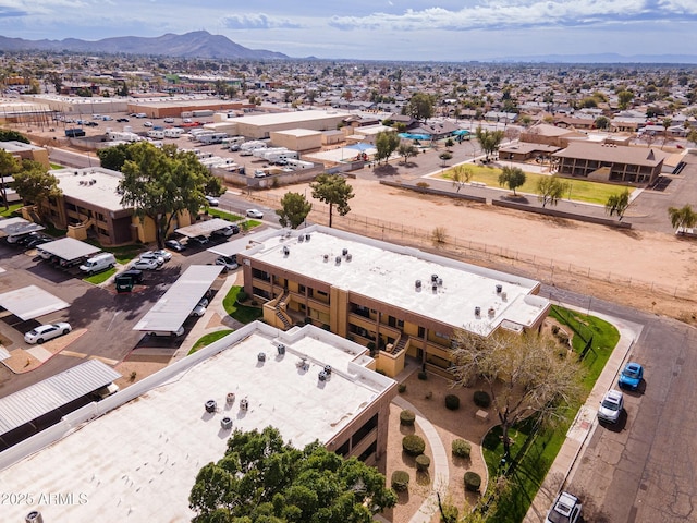 drone / aerial view with a residential view and a mountain view