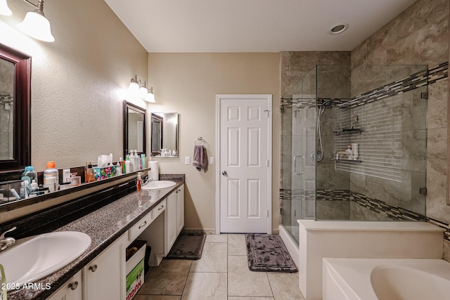 6640 W Honeysuckle Dr, Phoenix, AZ 85083 - bathroom featuring vanity, tile patterned floors, and plus walk in shower