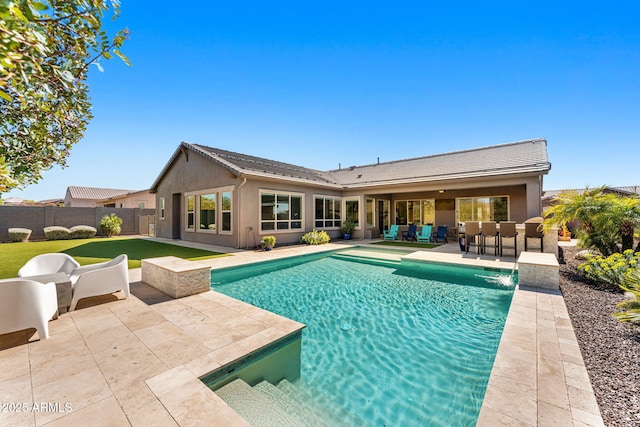 view of swimming pool with a patio area, a fenced in pool, outdoor dry bar, and fence