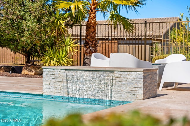 view of pool featuring fence and a fenced in pool