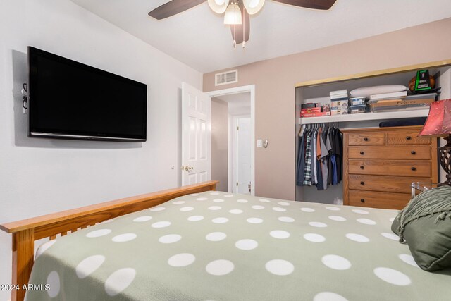 bedroom featuring a closet and ceiling fan