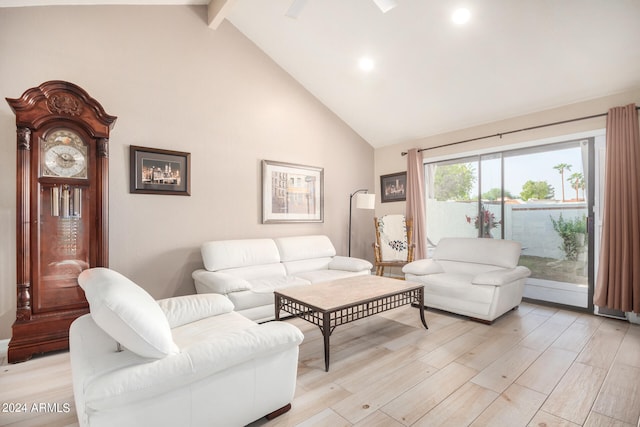 living room featuring beam ceiling, high vaulted ceiling, and light wood-type flooring