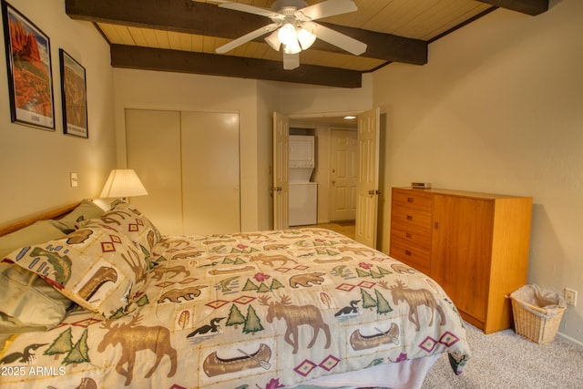 4575 Resort Loop Unit 6, Pinetop, AZ 85935 - bedroom featuring stacked washer / dryer, wooden ceiling, beamed ceiling, a closet, and carpet flooring