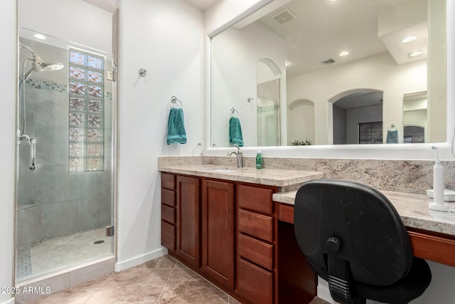800 W Sycamore Ct, Litchfield Park, AZ 85340 - bathroom featuring visible vents, a shower stall, tile patterned flooring, and vanity