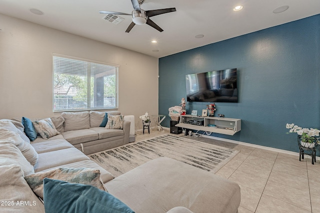tiled living room featuring baseboards, ceiling fan, visible vents, and recessed lighting