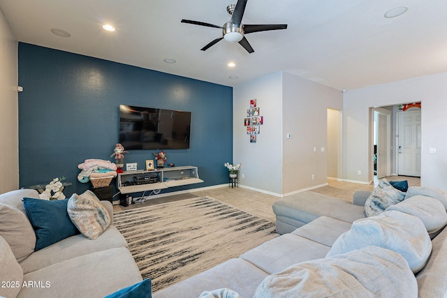 living area featuring baseboards, tile patterned flooring, recessed lighting, and a ceiling fan