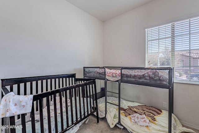 bedroom featuring multiple windows