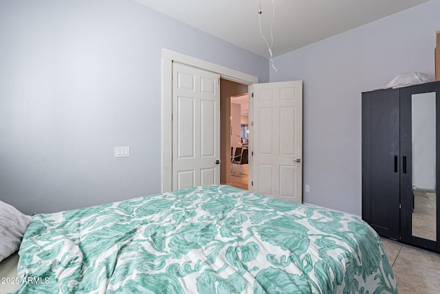 bedroom featuring light tile patterned floors