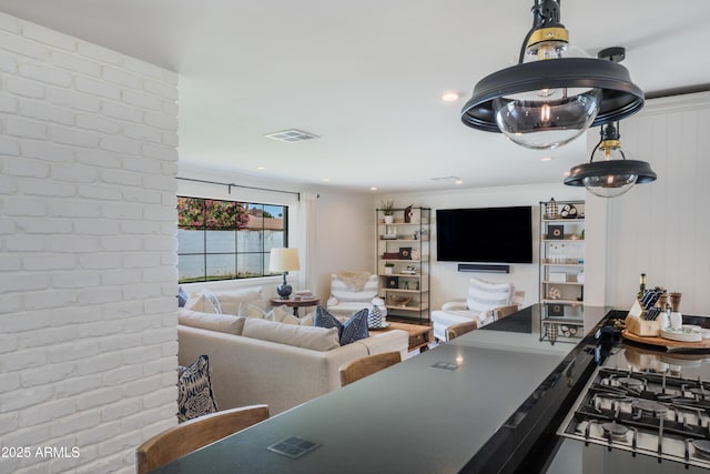 living area featuring visible vents