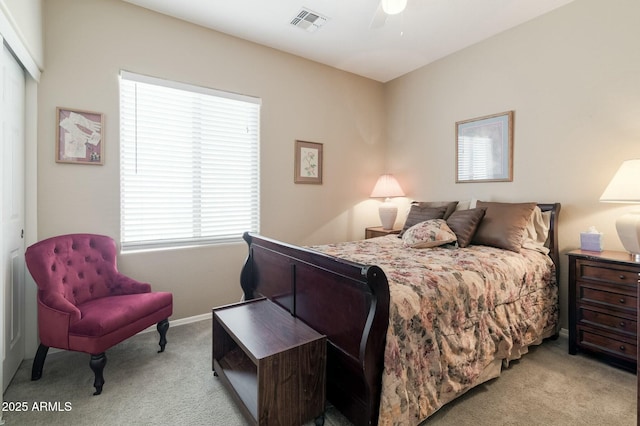 carpeted bedroom with ceiling fan