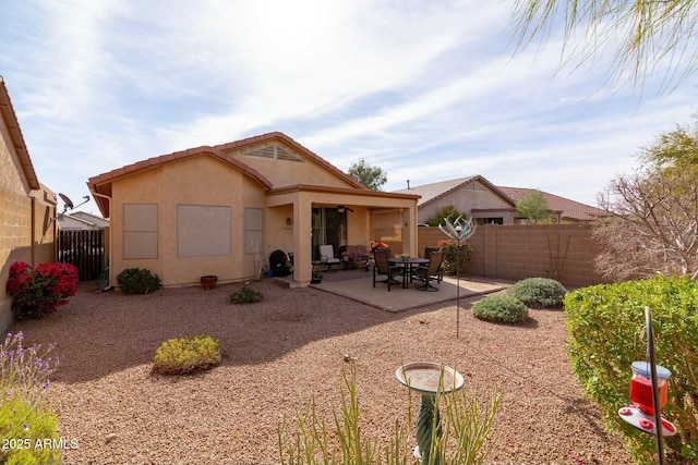 back of house featuring a patio