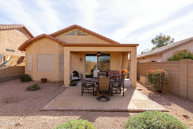 view of patio / terrace featuring ceiling fan