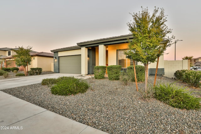 view of front of home featuring a garage