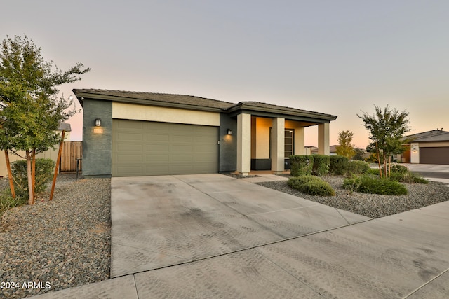 view of front of property featuring a garage