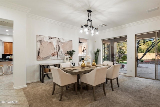 11193 N 121st Way, Scottsdale, AZ 85259 - dining room featuring ornamental molding, light carpet, a chandelier, light tile patterned flooring, and recessed lighting