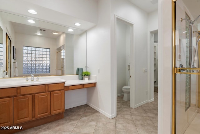 11193 N 121st Way, Scottsdale, AZ 85259 - bathroom featuring vanity, recessed lighting, a shower stall, and tile patterned flooring