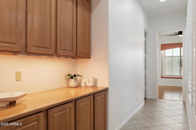 11193 N 121st Way, Scottsdale, AZ 85259 - bar featuring light tile patterned flooring and ceiling fan