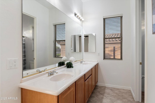 11193 N 121st Way, Scottsdale, AZ 85259 - bathroom featuring double vanity and tile patterned flooring
