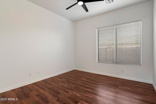 11193 N 121st Way, Scottsdale, AZ 85259 - unfurnished room featuring ceiling fan and dark wood-style flooring