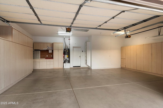 11193 N 121st Way, Scottsdale, AZ 85259 - garage featuring gas water heater and a garage door opener
