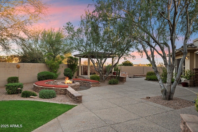 11193 N 121st Way, Scottsdale, AZ 85259 - fenced backyard with a fire pit, a patio, and a gazebo