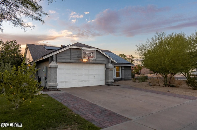 view of front of property featuring a garage