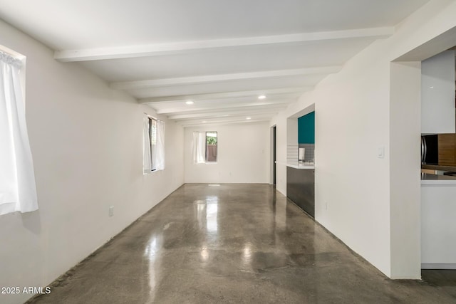 5739 N 11th St, Phoenix, AZ 85014 - hallway with beamed ceiling, finished concrete flooring, and recessed lighting