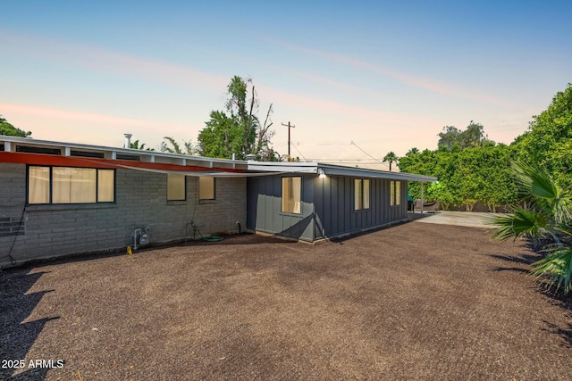 5739 N 11th St, Phoenix, AZ 85014 - view of front facade featuring board and batten siding
