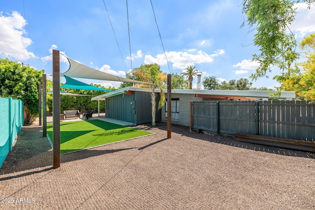 5739 N 11th St, Phoenix, AZ 85014 - fenced backyard with a patio area