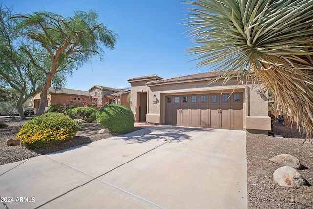 view of front of home with a garage